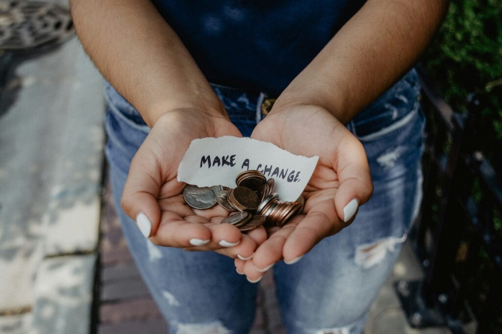 Woman's palms collecting donations