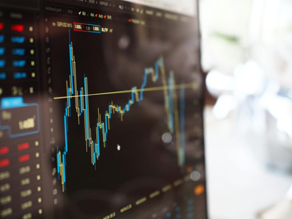 close up photo of a monitor showing stocks and investments